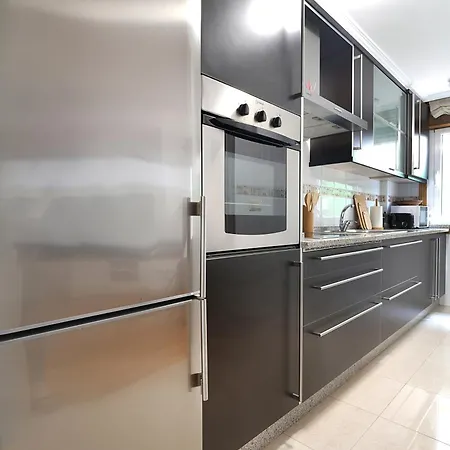 Galihost - Con Piscina Y Terraza En Playa Lanzada アパート サンシェンショ